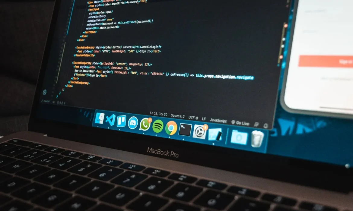 Website code on a laptop screen during a Singapore web design build