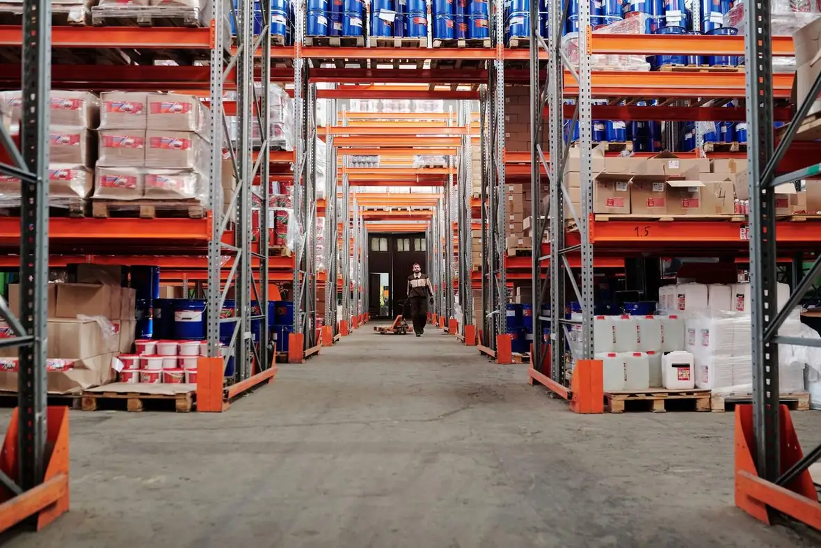 Warehouse aisle stocked with products ready for online order fulfilment