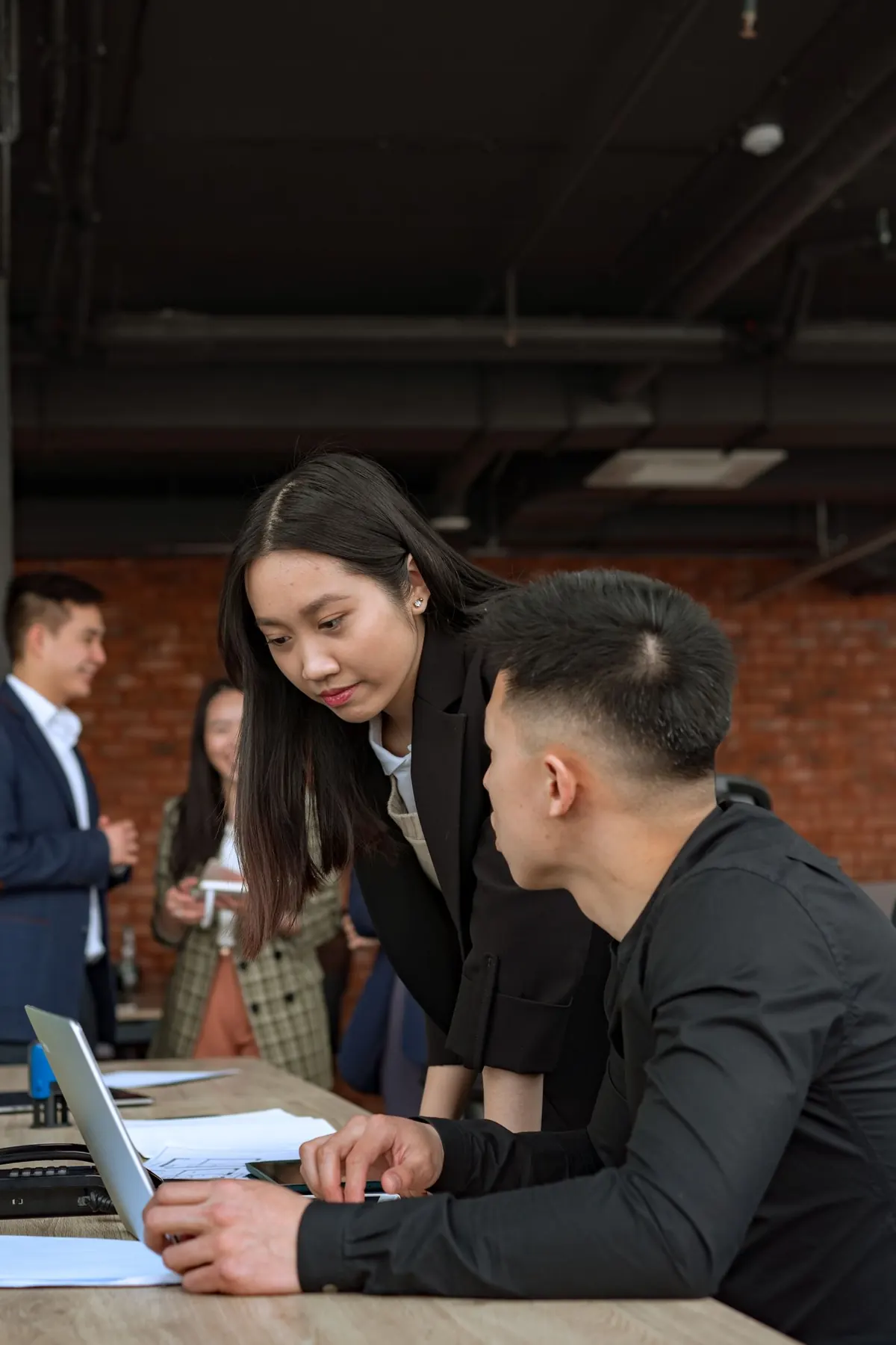 Web design agency team working together on a client project in Singapore