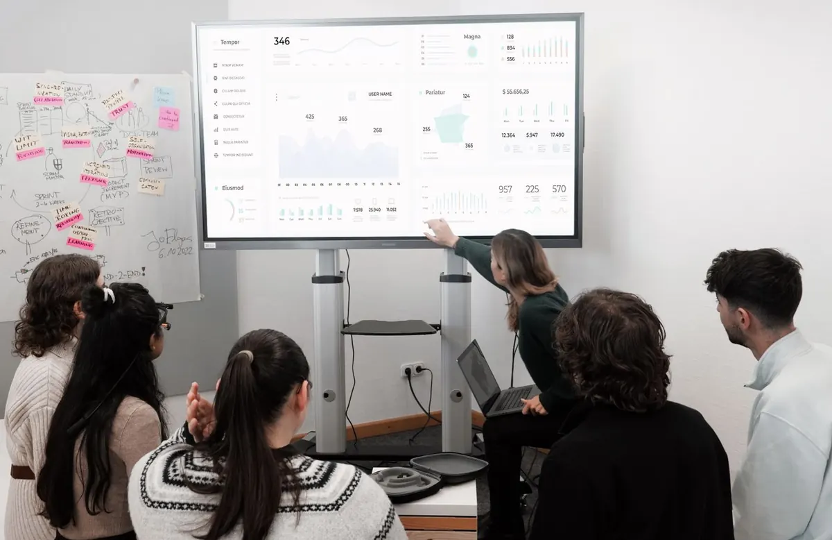Team reviewing website performance and search data on a dashboard before launch