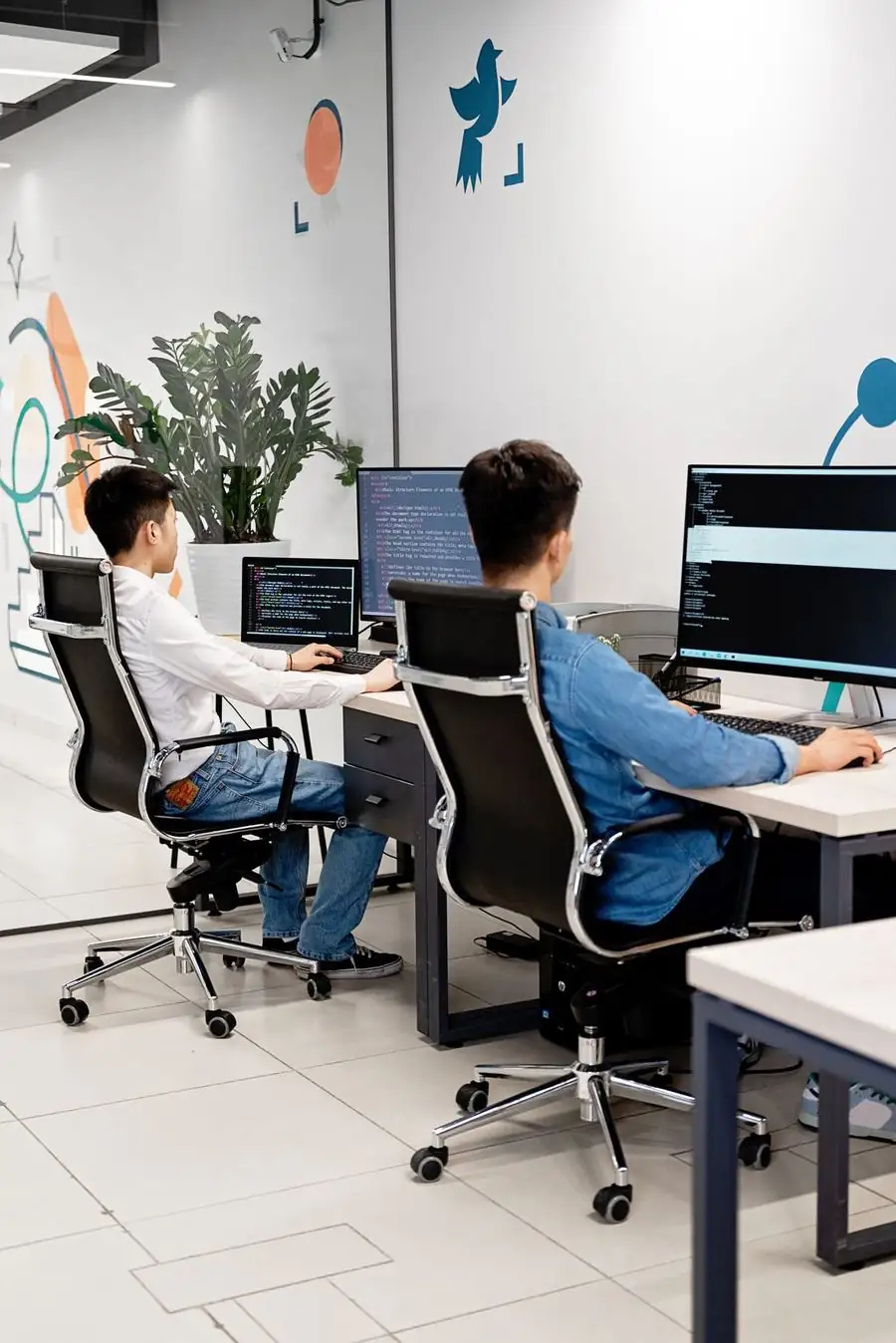 Web development company Singapore team working through a build together
