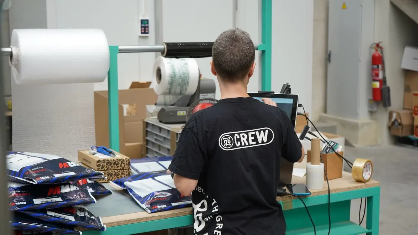 Order packing bench at a Singapore fulfilment desk, the daily reality behind ecommerce SEO Singapore work