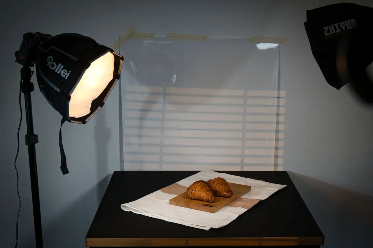 Studio lighting set up over a product on a shoot table for catalogue photography