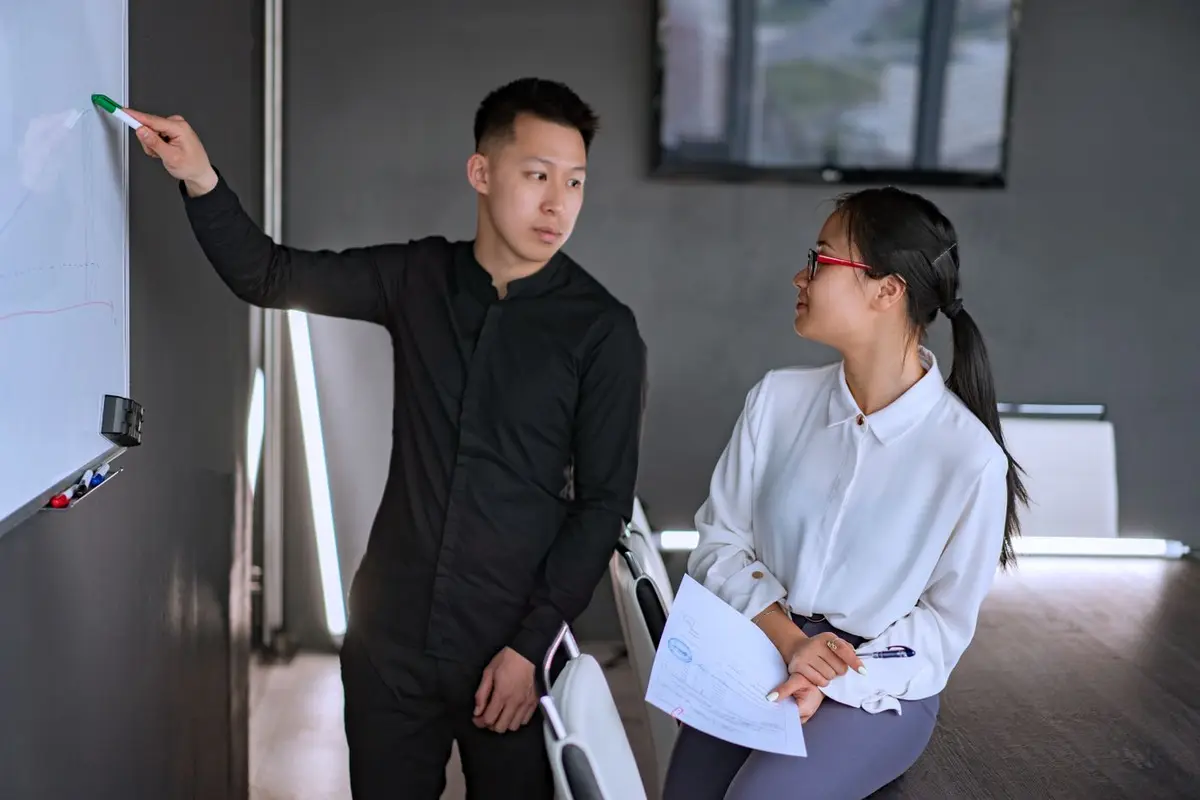 SEO consultant Singapore session: mapping the ranking thesis on a whiteboard with the client